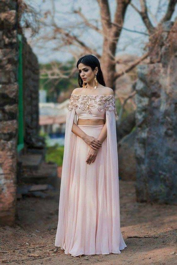 Pink off shoulder cape style crop top and skirt 